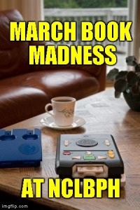 A coffee table with a cup of coffee and a digital talking player and cartridge. The words "March book madness at nc lbph" are shown on top of these things. 
